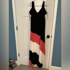 Sleeveless dress with one strap on. & one strap off shoulder.